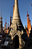 Inle Lake Myanmar. Indein, on the summit of a hill the  Shwe Inn Thein Paya a cluster of hundreds of ancient stupas. Many of them are ruined and overgrown with bushes.